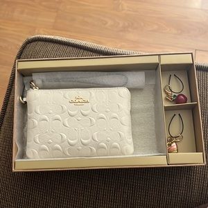 Coach wallet with charms